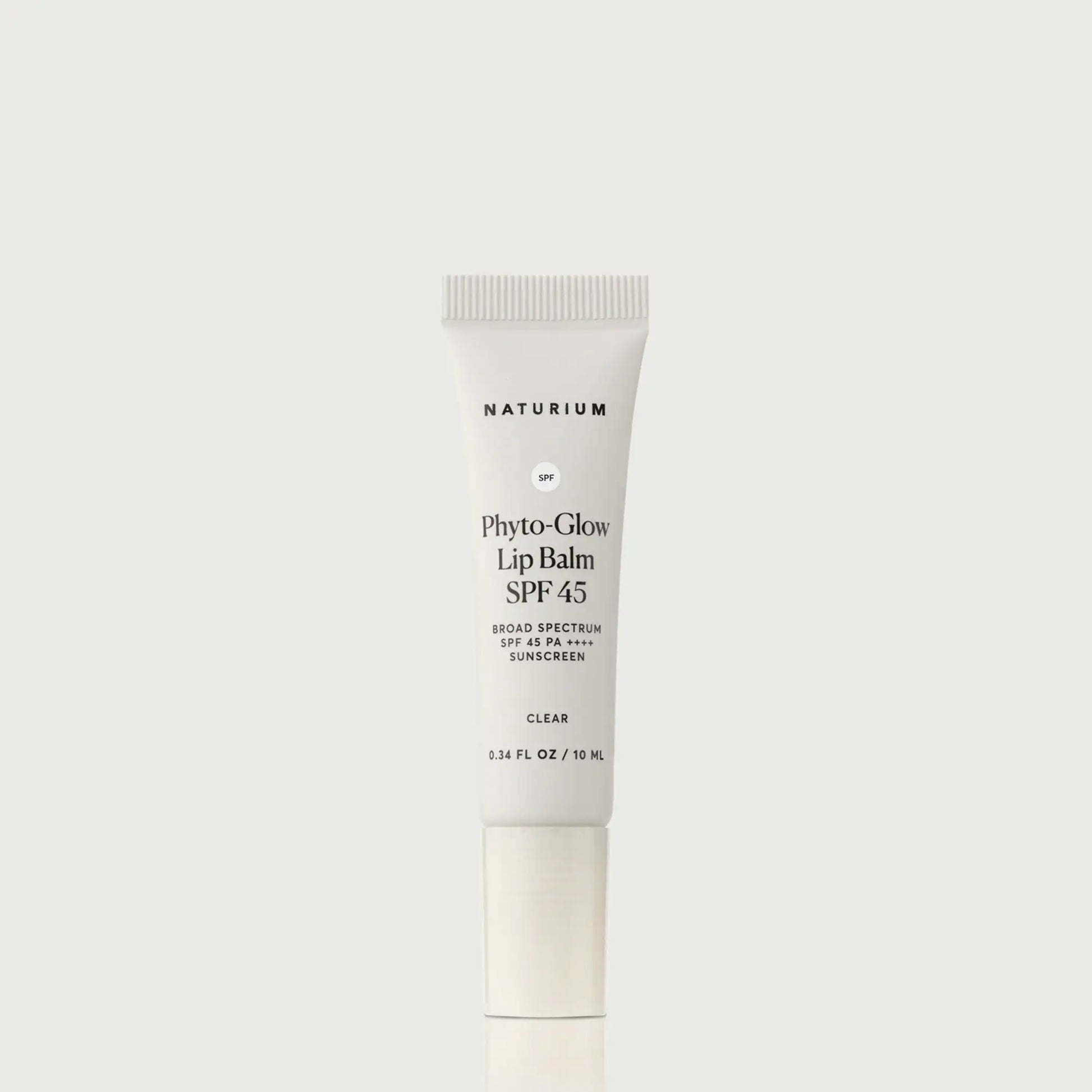 phyto-glow-lip-balm-spf-45-clear-e6 NATR-10124_PhytoGlow_SPF_Clear_primary_capon_front_bonebkgd_1.webp