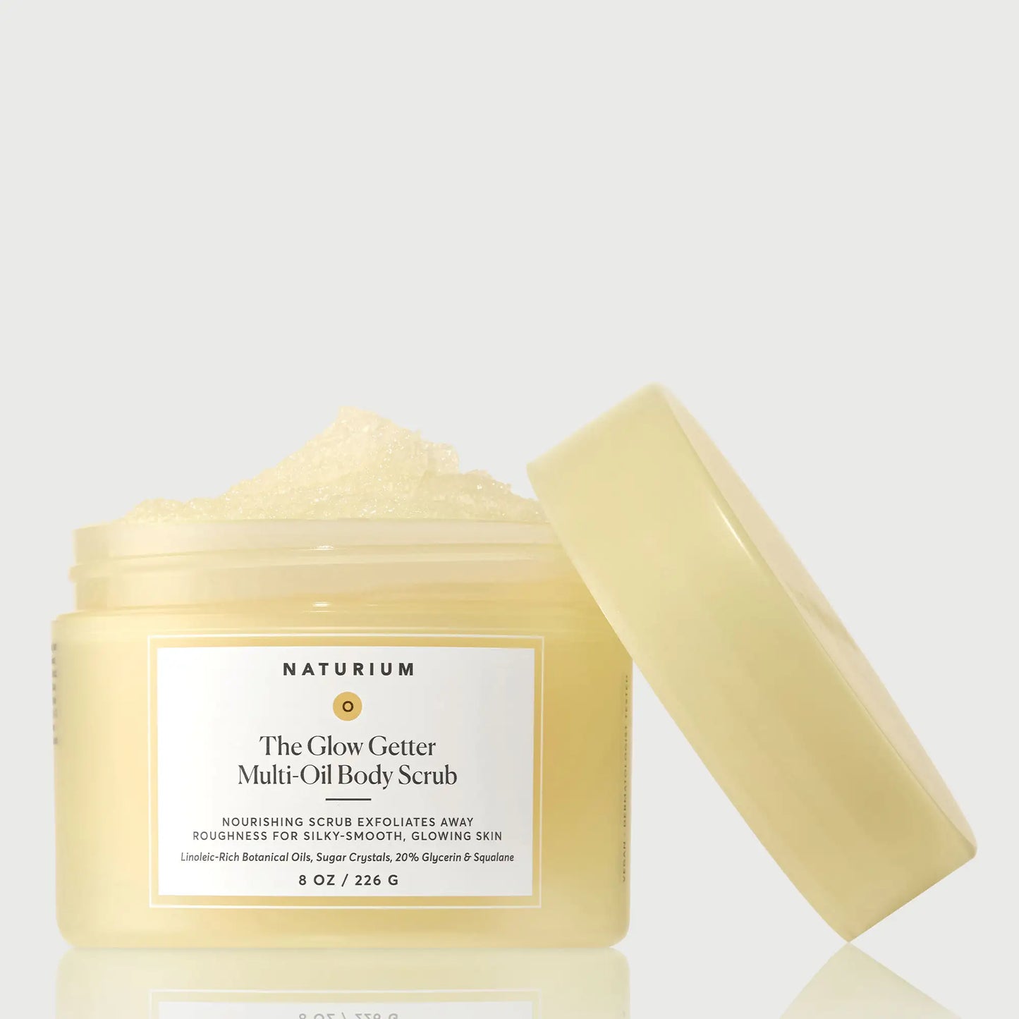 the-glow-getter-multi-oil-body-scrub-c0 NATR-40028-GlowGetter-Multi-Oil-Body-Scrub-Front-CapOff-bonebkgd.webp